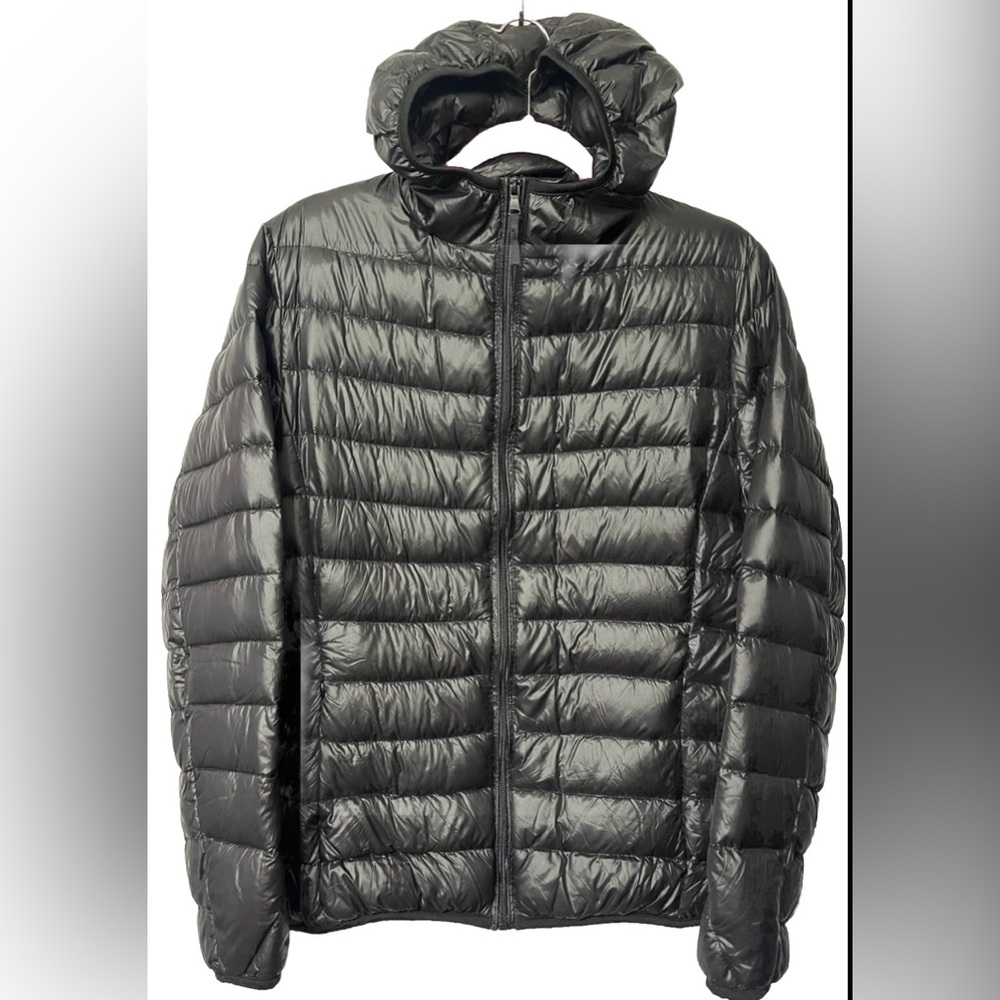 Black Puffer Jacket, New without tags. Size large. Down insulation.